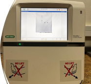 A machine with a screen and a button

AI-generated content may be incorrect.