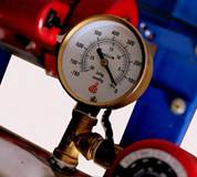 Close-up of a pressure gauge
AI-generated content may be incorrect.